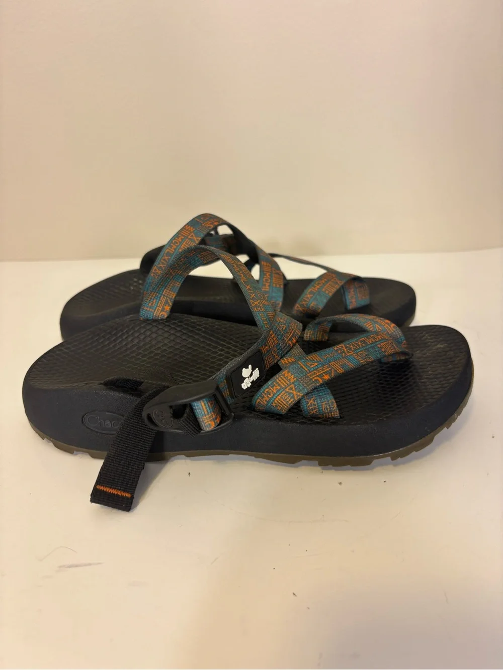 Chaco Black Sandals with Teal and Orange Patterned Straps Open Back Men’s 7